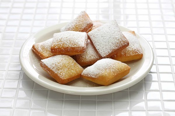 Comment préparer des beignets de fleurs de courgette croustillants et légers ?